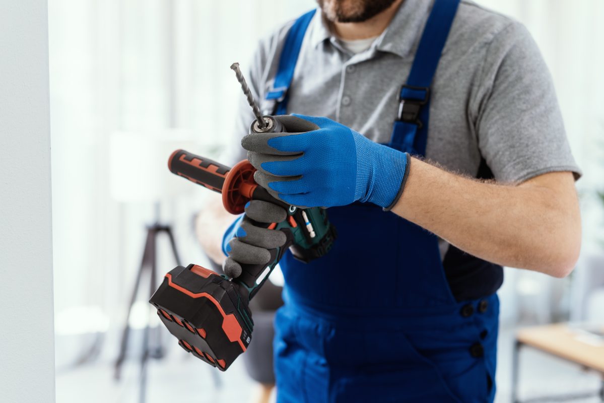 professional handyman using a drill 2022 12 14 03 51 56 utc